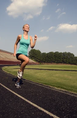 Free Stock Photo: A young woman jogging outdoors