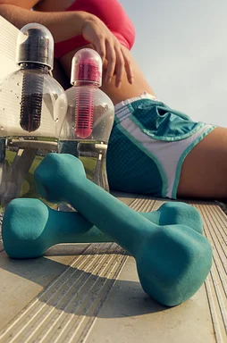 Free Stock Photo: A healthy young woman taking a break from her exercise
