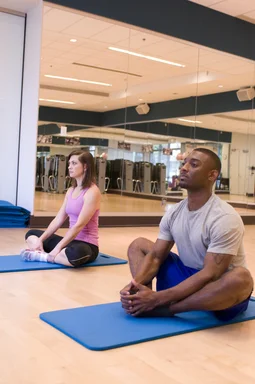 Free Stock Photo: A man and woman working out in a fitness center
