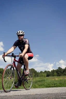 Free Stock Photo: A young man riding a bicycle