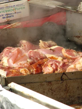 Free Stock Photo: Meat cooking on a smokey grill