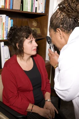 Free Stock Photo: A woman being given an eye exam by her doctor