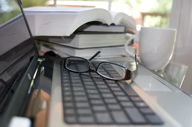 Free Stock Photo: A laptop keyboard with glasses