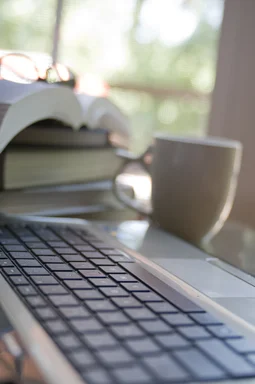 Free Stock Photo: A laptop keyboard with coffee