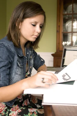 Free Stock Photo: A female student reading a book