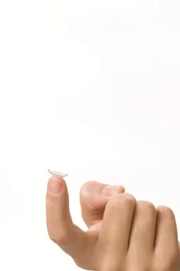 Free Stock Photo: Close-up of a girl holding a contact lens