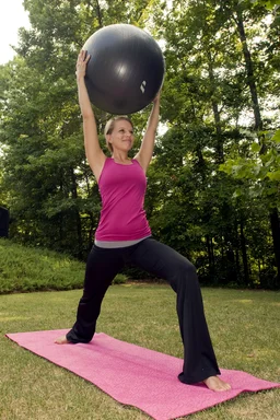 Free Stock Photo: A young woman stretching before exercise