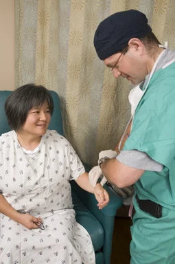 Free Stock Photo: A female patient being examined by her doctor