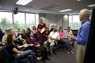 Free Stock Photo: Men and women at a town hall meeting