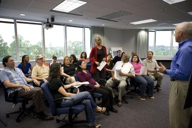 Free Stock Photo: Men and women at a town hall meeting