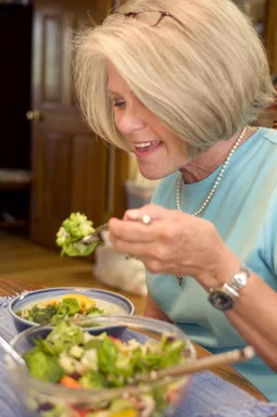 Free Stock Photo: A woman eating a fresh salad