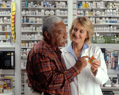 Free Stock Photo: A man consulting his pharmacist