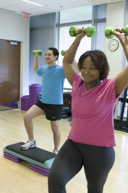 Free Stock Photo: Men and women performing aerobic exercises