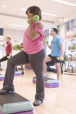 Free Stock Photo: Men and women performing aerobic exercises