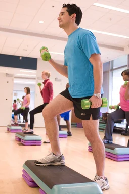 Free Stock Photo: Men and women performing aerobic exercises