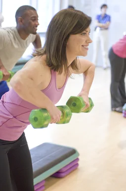 Free Stock Photo: Men and women performing aerobic exercises