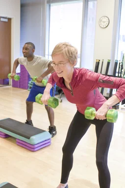 Free Stock Photo: Men and women performing aerobic exercises
