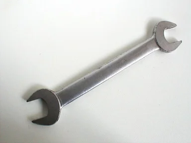 Free Stock Photo: Closeup of a worn silver wrench