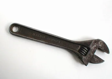 Free Stock Photo: Old worn wrench on a white background