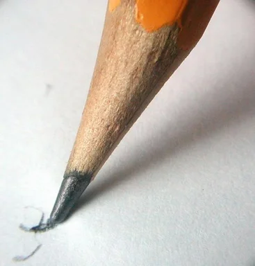 Free Stock Photo: Closeup of a pencil writing on paper