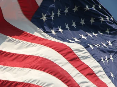Free Stock Photo: Closeup of a US flag flying in the wind