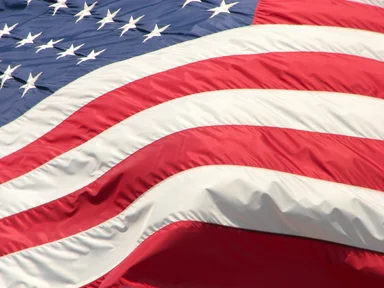 Free Stock Photo: Closeup of a US flag flying in the wind