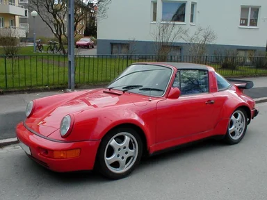 Free Stock Photo: A red porsche parked along the curb