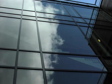 Free Stock Photo: Sky reflecting on a modern glass building