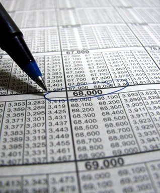 Free Stock Photo: Closeup of a tax income chart and pen