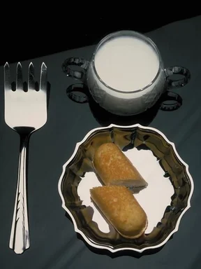 Free Stock Photo: Table setting with a glass of milk and a cookie