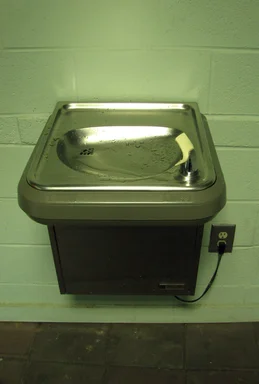 Free Stock Photo: A drinking fountain hanging on a wall