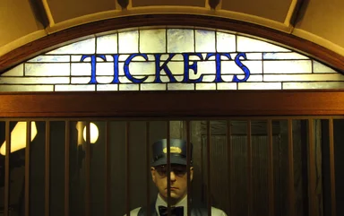 Free Stock Photo: Statue of a man in a ticket booth