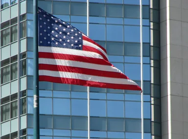 Free Stock Photo: US flag in front of modern building
