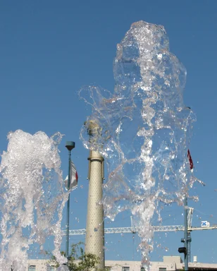 Free Stock Photo: Flags by a fountain