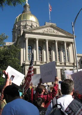 Free Stock Photo: Protest flags and signs in front of the State Capitol building at the 2009 tax day tea party in Atlanta, Georgia
