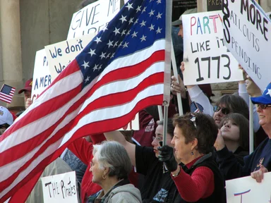 Free Stock Photo: Protesters with flags and signs at the 2009 tax day tea party in Atlanta, Georgia