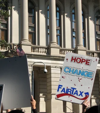 Free Stock Photo: Protest flags and signs in front of the State Capitol building at the 2009 tax day tea party in Atlanta, Georgia