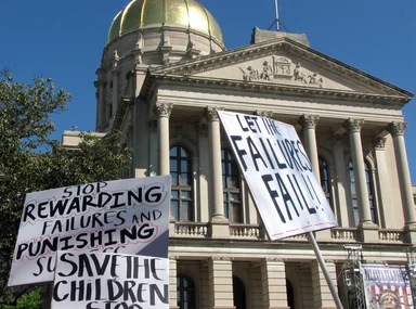 Free Stock Photo: Protest signs in front of the State Capitol building at the 2009 tax day tea party in Atlanta, Georgia