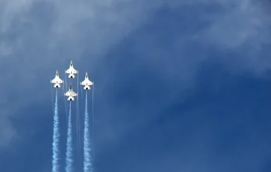 Free Stock Photo: F-16 Air Force Thunderbird jets flying in formation at the 2009 Robins AFB Air Show.
