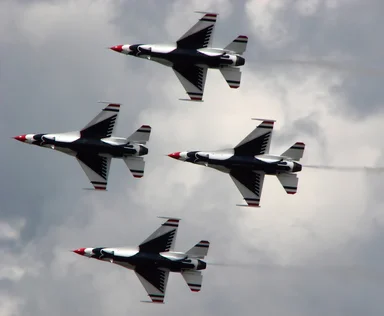 Free Stock Photo: F-16 Air Force Thunderbird jets flying in formation at the 2009 Robins AFB Air Show.
