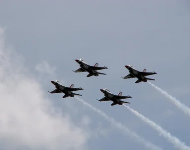 Free Stock Photo: F-16 Air Force Thunderbird jets flying in formation at the 2009 Robins AFB Air Show.