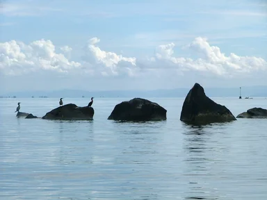Free Stock Photo: Rocks on a calm ocean