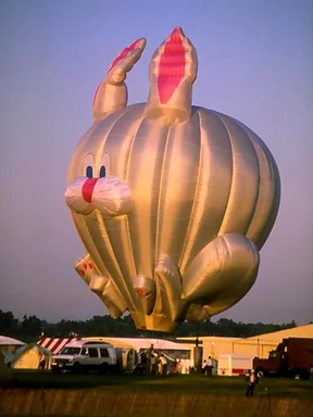 Free Stock Photo: A hot air balloon shaped like a rabbit being inflated