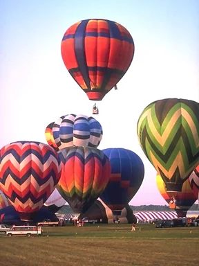 Free Stock Photo: Hot air balloons taking off from a field