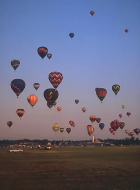 Free Stock Photo: Hot air balloons taking off from a field