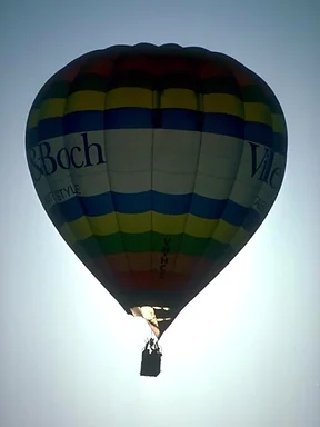 Free Stock Photo: Silhouette of a hot air balloon flying in the sky