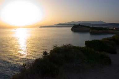 Free Stock Photo: The sun rising up over a lake