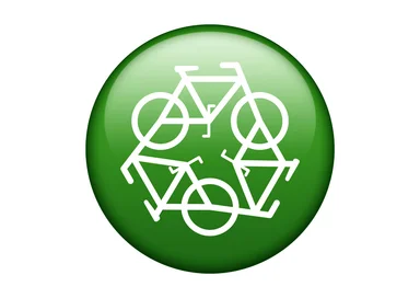Free Stock Photo: A green recycle symbol of white bikes on a white background