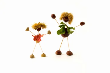 Free Stock Photo: Men made out of nuts isolated on a white background