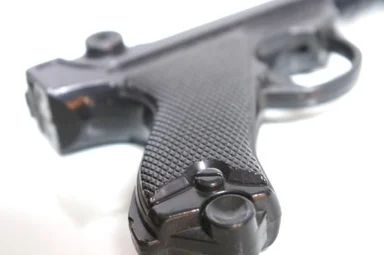 Free Stock Photo: A toy gun isolated on a white background